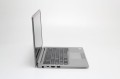 Dell Latitude 7400 – ujęcie z tyłu, z otworami wentylacji i naklejka znamionowa